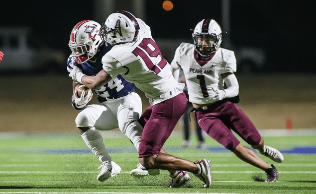 DEFENSIVE EFFORT - Pearland made a strong defensive effort against the Atascocita Eagles but came up short 21-6 that eliminated the Oilers from the Class 6A Region III Div. I area round. Junior K'Von Sherman (19) and senior Kele Linton (1) try to tackle Atascocita's Quincy Thompson (24). Pearland closes out the 2020 season with an 8-3 record. (Photo by Lloyd Hendricks)